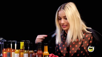 Margot Robbie Struggles To Hold It Together As She Suffers Her Way Through The ‘Hot Ones’ Challenge