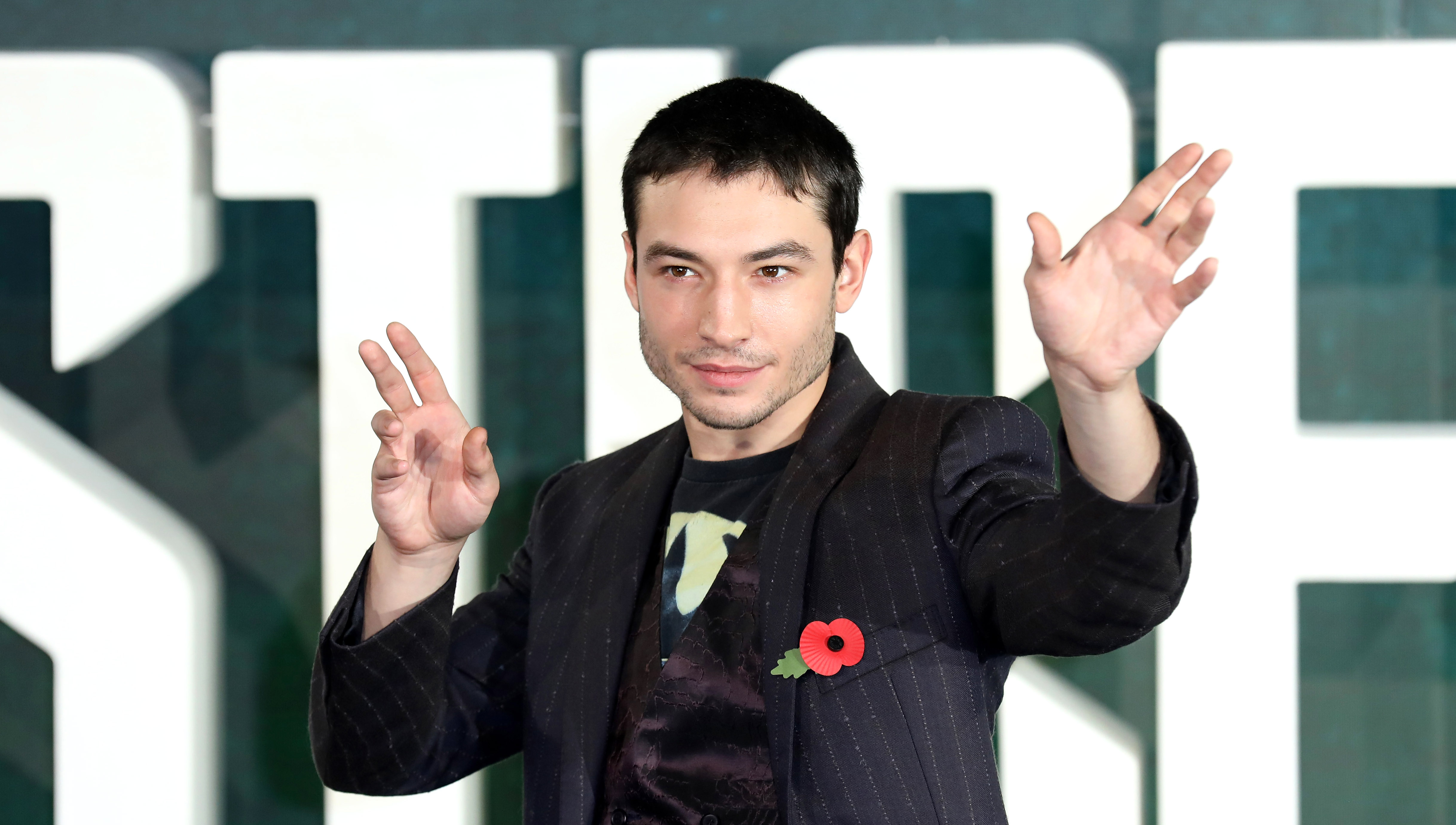 'Justice League' Star Ezra Miller Appears To Choke And Take Down A