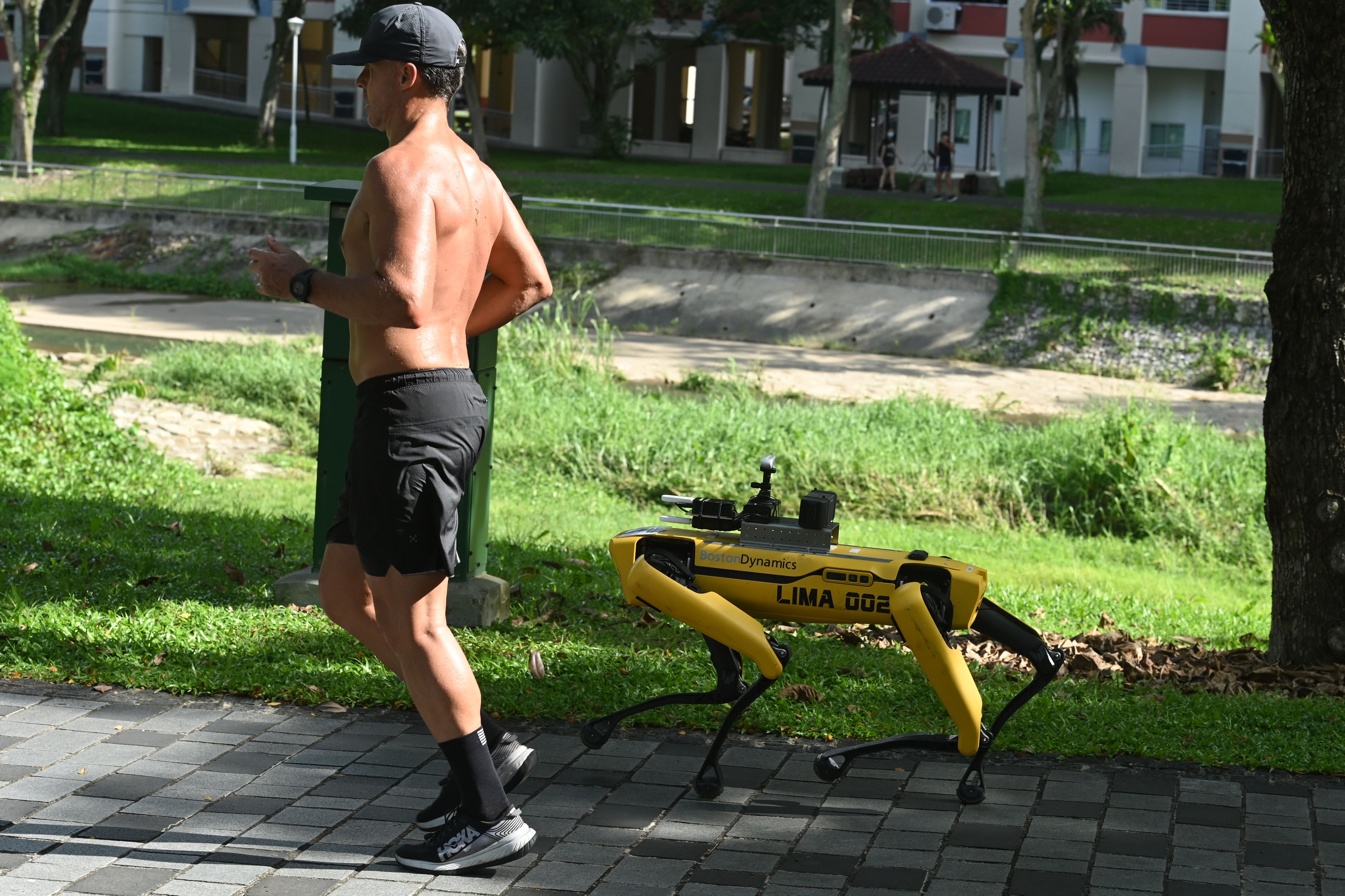 Super Creepy RemoteControlled Robot Patrols Park in Singapore To Warn