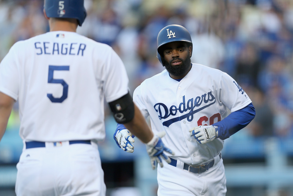 Dodgers' Andrew Toles arrested after sleeping behind Florida airport
