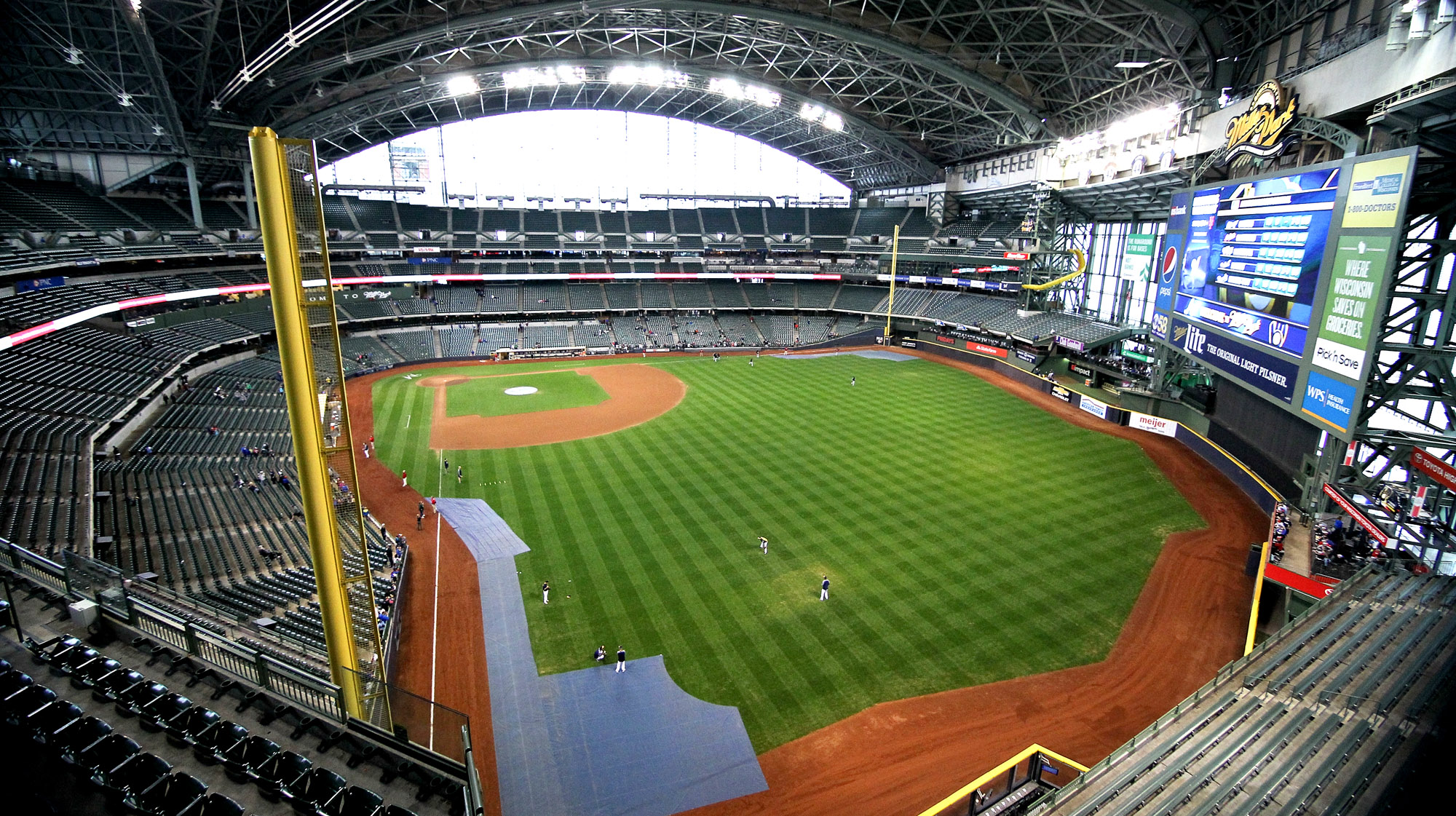 Watch: Man breaks into Brewers' ballpark, attempts to write name using  tractor