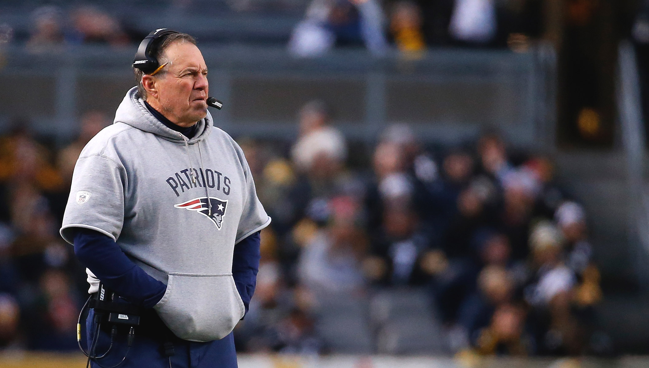 Why Does Bill Belichick Cut The Sleeves Off His Sweatshirts? The Answer