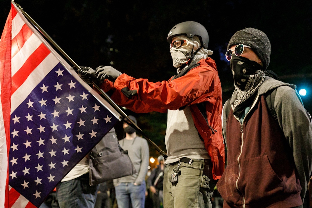 Watch This Portland Protestor Catch A Tear Gas Cannister With A
