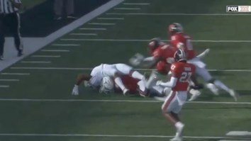 Texas’ Bijan Robinson Tries To Hurdle Defender, Suffers Incredibly Scary Fall