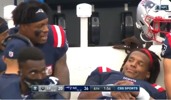 Cam Newton’s Hilarious Sliding Down The Bench Reaction While Talking To