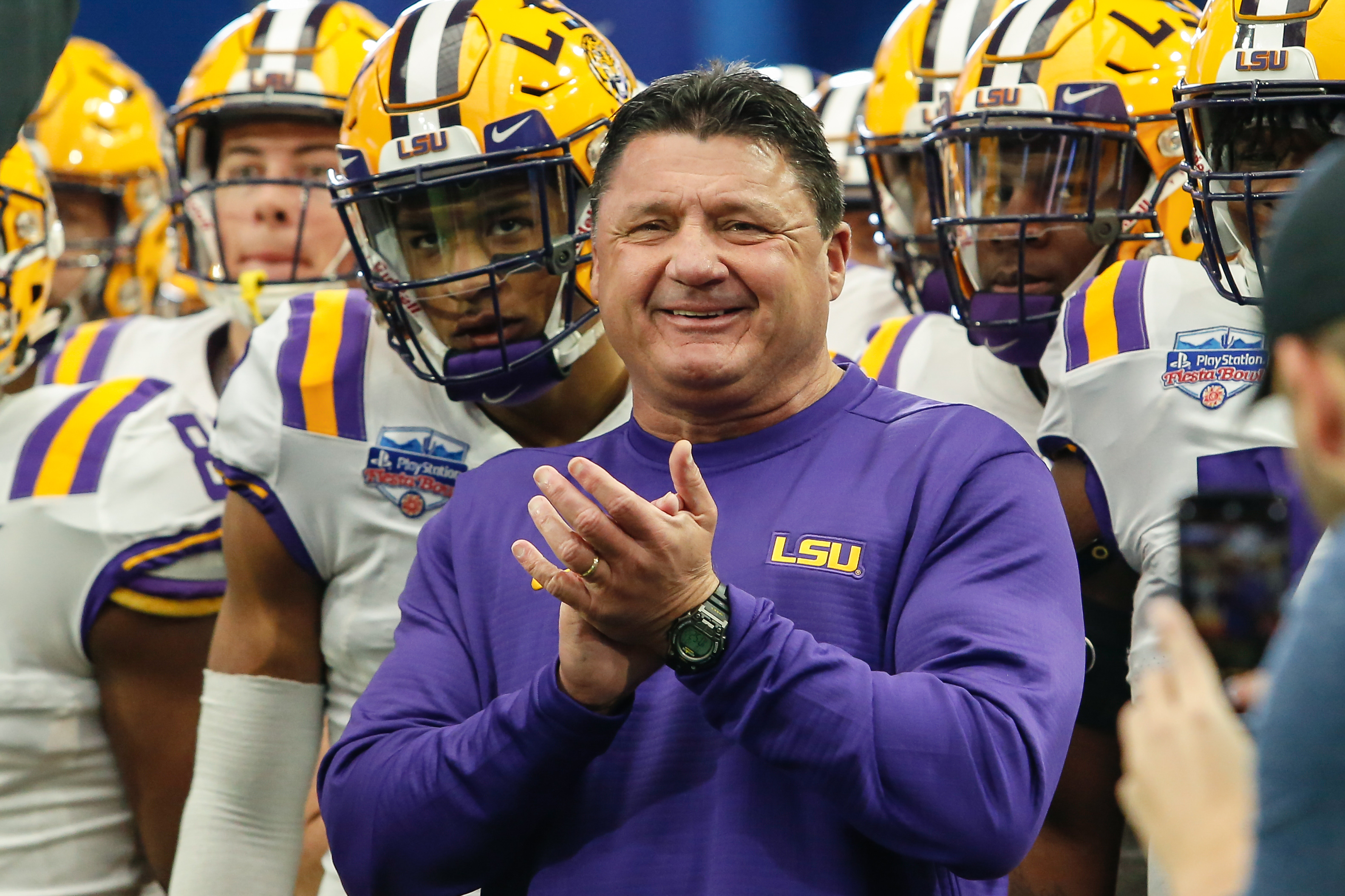Photo Of LSU Head Coach Ed Orgeron In Bed With A Much Younger