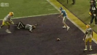 Ref Gets Knocked Out Cold On The Field After Ole Miss QB Matt Corrall Accidentally Trucks Him During TD Run