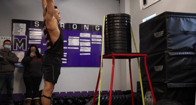 Chris Spell Does A 67-Inch Standing Box Jump To Break A World Record