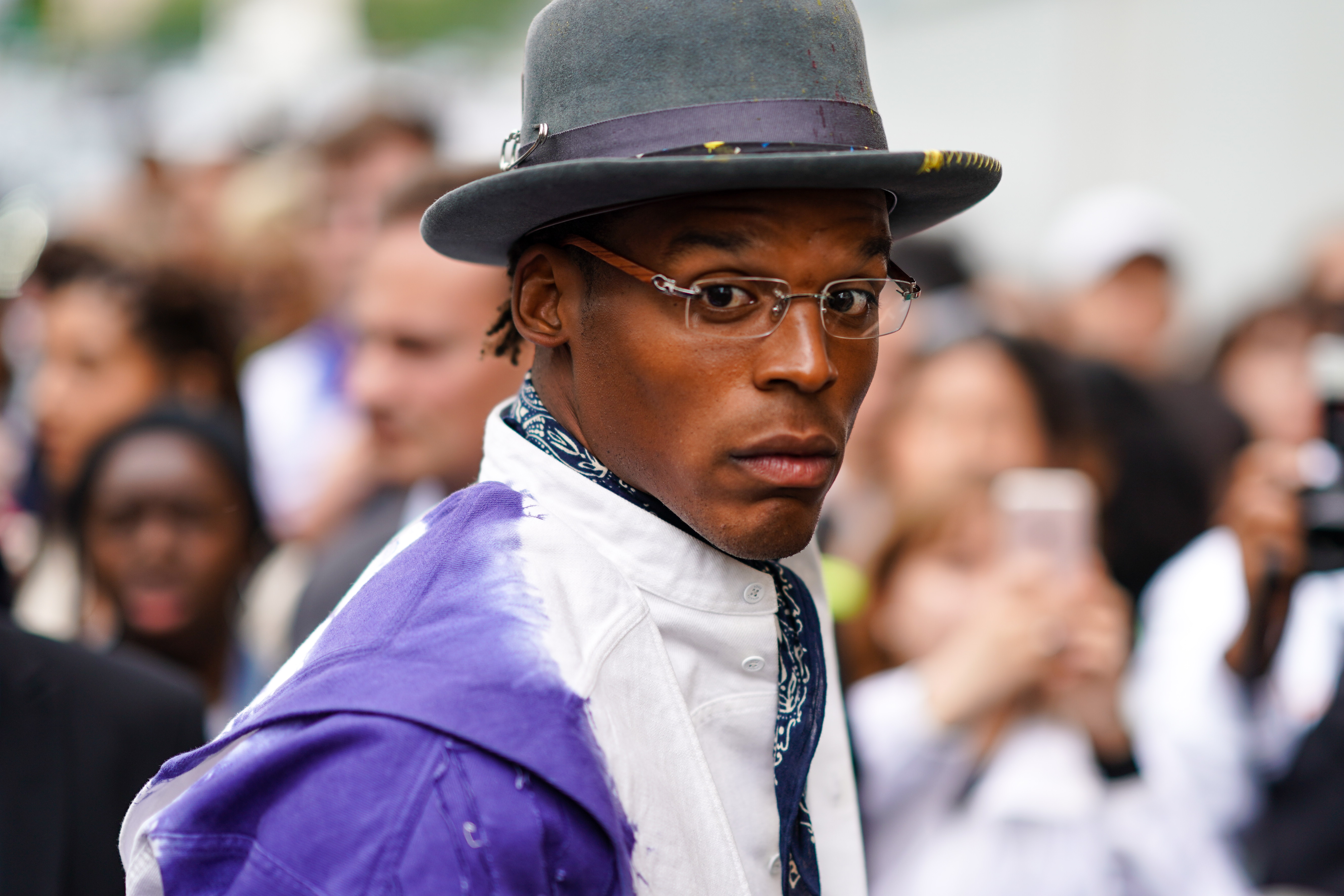 Cam Newton is sporting a fetching wide-brimmed hat and a bleached goatee