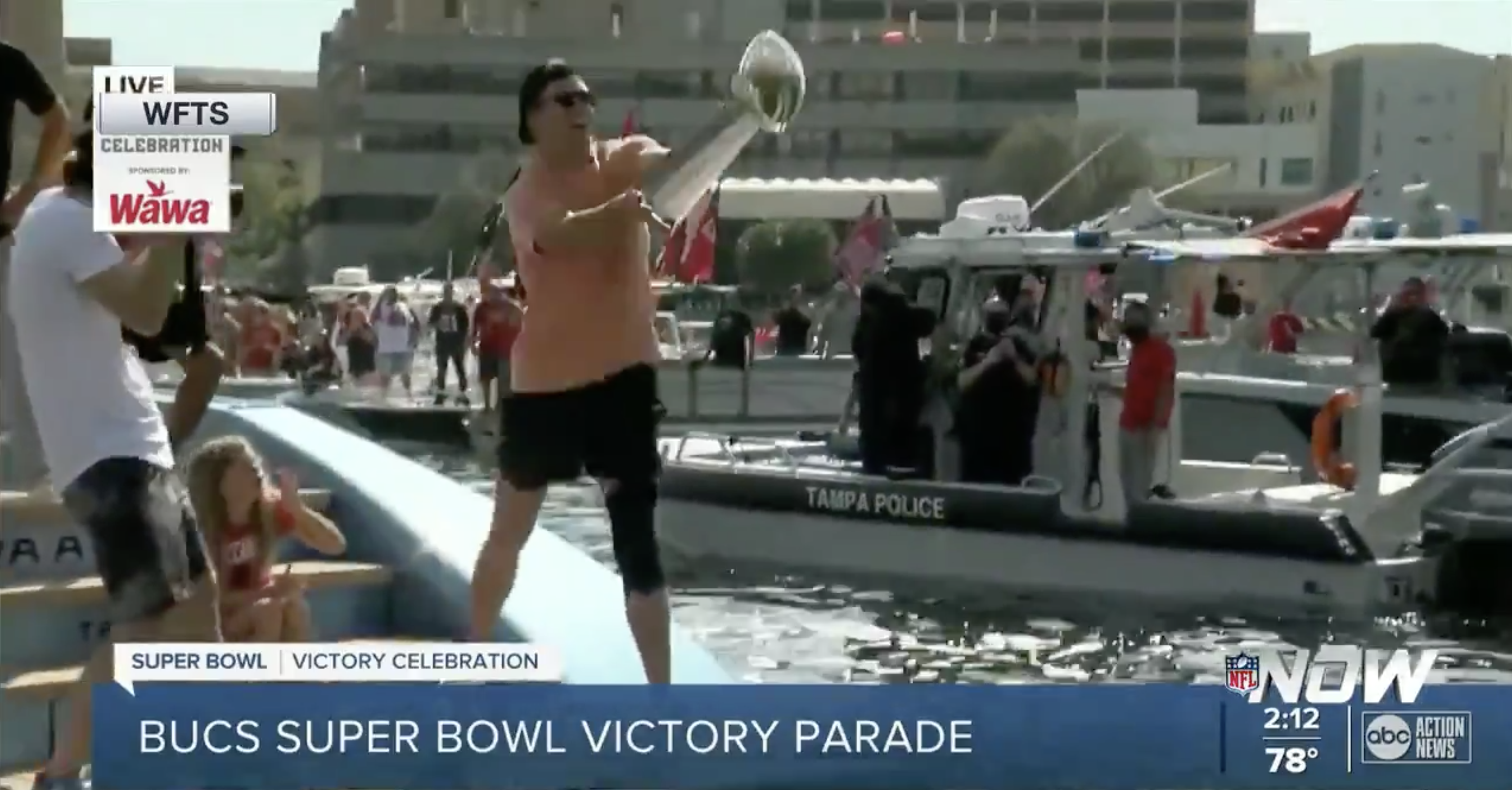 Tom Brady throws Super Bowl trophy from one boat to another