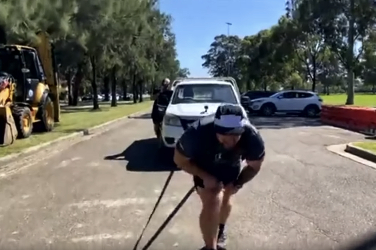 Guy Sets 'World's Strongest Marathon' Record By Pulling 1.5-Ton Truck For  26.2 Miles - BroBible