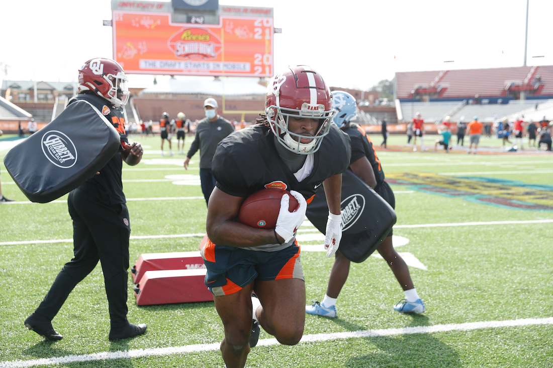 Najee Harris shows off upcoming clothing brand at Alabama's pro day