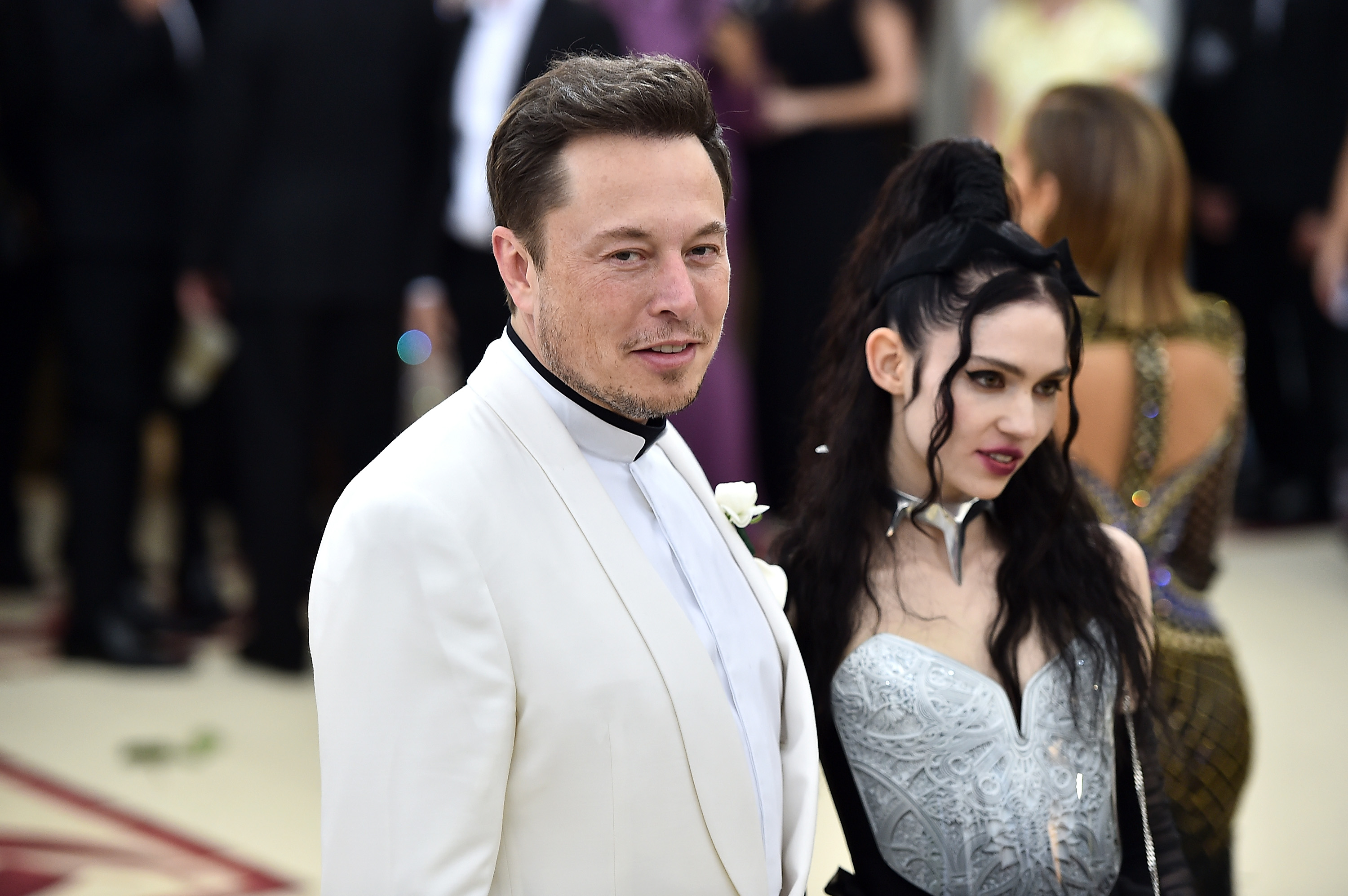 Elon Musks girlfriend Grimes reveals alien scars tattooed on back   Hurts too much  Weird  News  Expresscouk