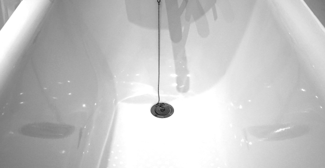 Woman Images Strange Light Coming From Her Hotel Bathtub Drain