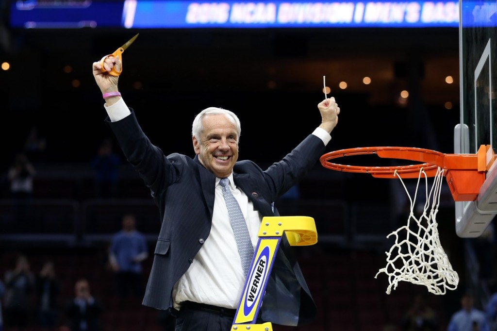 Roy Williams cutting down nets