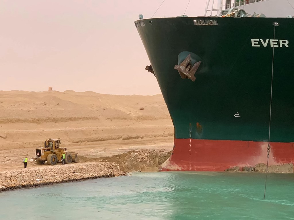 Suez Canal ship and excavator
