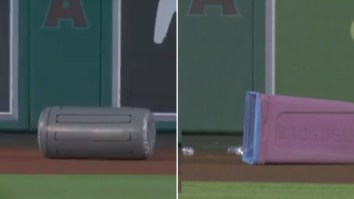Security Forced To Guard Outfield Wall Because Angels Fans Couldn’t Stop Throwing Trash Cans On The Field During Game Vs Astros