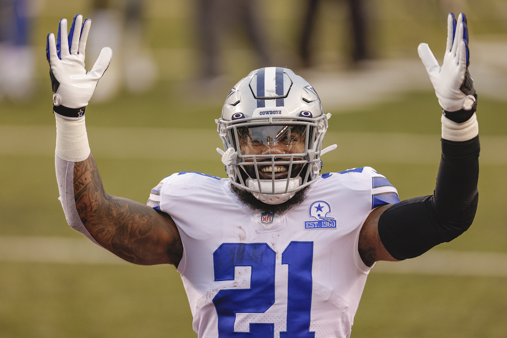 Abs and all, this tiny Cowboys fan is rocking the perfect Ezekiel