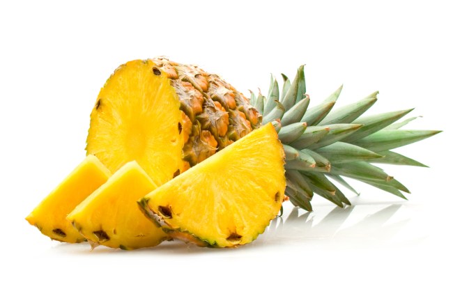 How do pineapples grow? Most people think pineapples grow on trees but the tropical fruit actually blossoms on a bush.