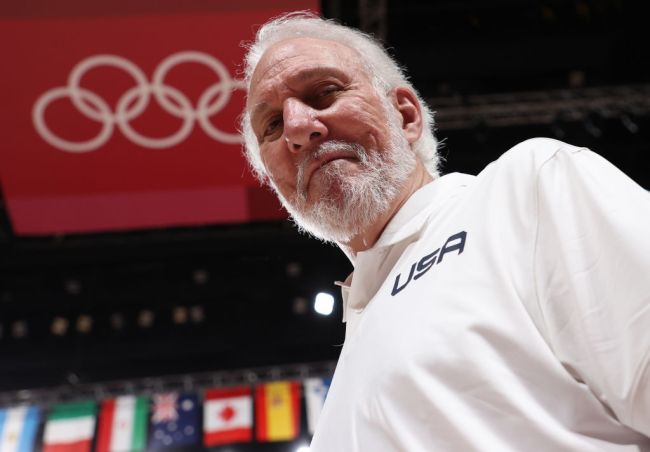 Team United States Head Coach Gregg Popovich celebrates during the Men's Basketball medal ceremony on day fifteen of the Tokyo 2020 Olympic Games at Saitama Super Arena on August 07, 2021 in Saitama, Japan.