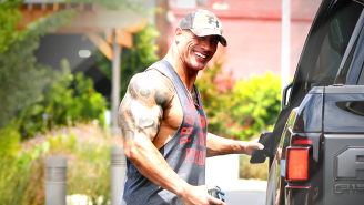 The Rock Rolls Up On A Tour Bus In His Neighborhood, Shocks The Fans On Board