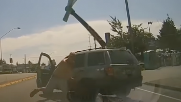 Dashcam Captures Man Chucking An Axe Through A Windshield During Insane Road Rage Incident