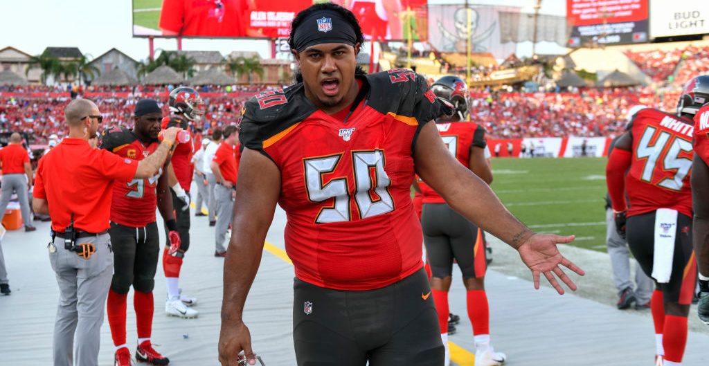 Vita Vea has a hard time swapping jerseys