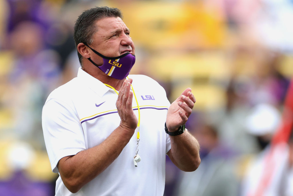 Ex-LSU Tigers coach Ed Orgeron 'living best life' after being spotted  chatting to bikini-clad women on beach