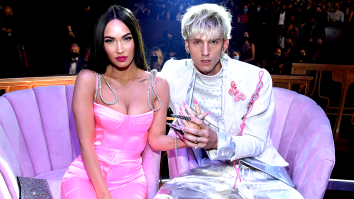 Machine Gun Kelly Pelted With Bottles And Tree Branches As He Flips Off Haters