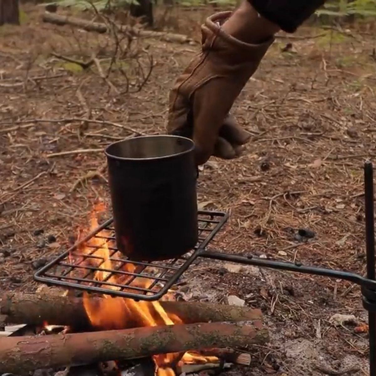 Learn To Cook Over An Open Flame Like A Master With This Swing Arm Grill