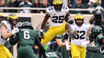 College Football Fans Blast Playoff Chairman’s Bizarre Comments About Michigan, Michigan State