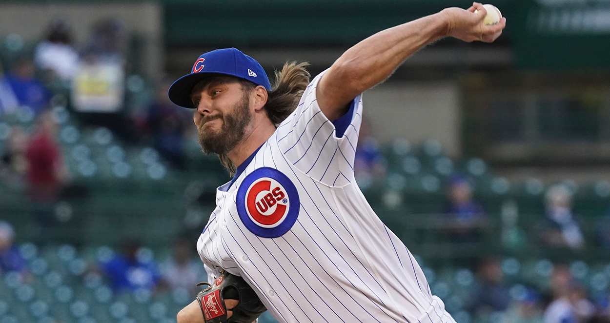 Arizona Diamondbacks starting pitcher Wade Miley delivers during the first  inning of the Wrigley Field 100th anniversary game at Wrigley Field on  April 23, 2014 in Chicago. The Cubs wore the uniforms