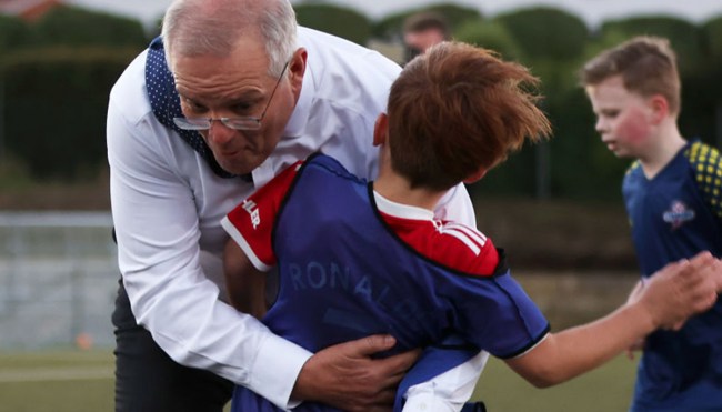 Australia's Prime Minister Literally Tackles Kid While Playing Soccer