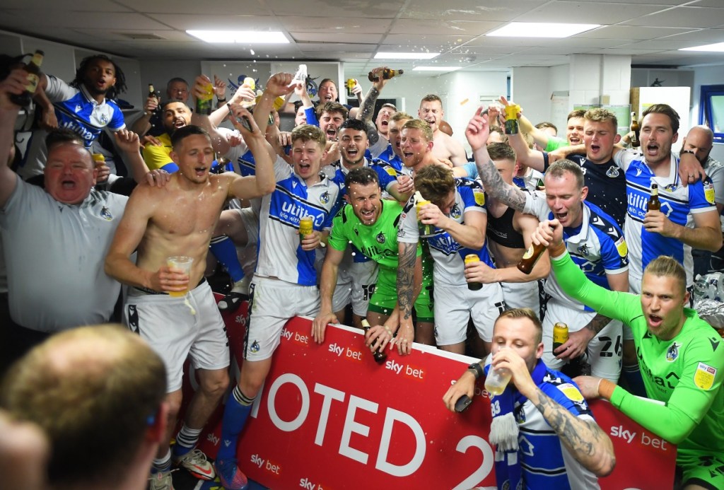 Bristol Rovers Player Chugs Beer On Top Of Lamp Post As Crowd Cheers After League one Promotion Following Scoring Scandal