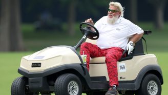John Daly Making An Appearance On Live TV While Smoking A Cigarette From His RV In A Church Parking Lot Is So On Brand