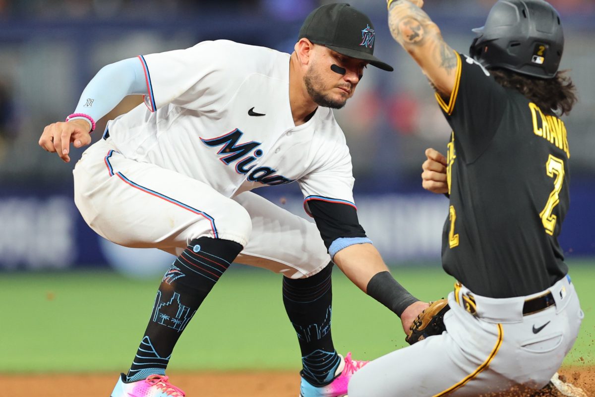 Marlins SS Miguel Rojas loses piece of tooth in collision with