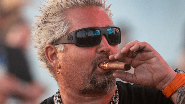 Guy Fieri Reveals Why He Wears His Sunglasses On Back Of His Head