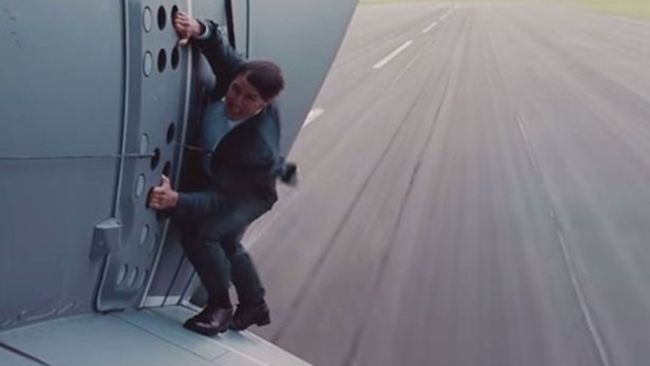 Tom Cruise Hangs Off Side Of A Plane In Unearthed CinemaCon Footage