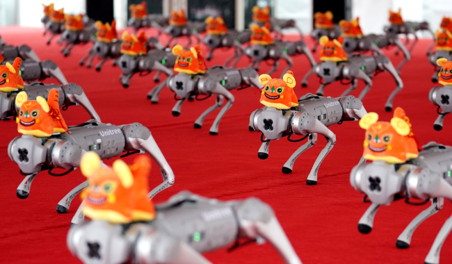 China Combines Drones With Robot Dogs Armed With Machine Guns