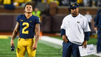 Michigan Coach Mike Hart Carted Off Sideline After Suffering Scary Medical Incident