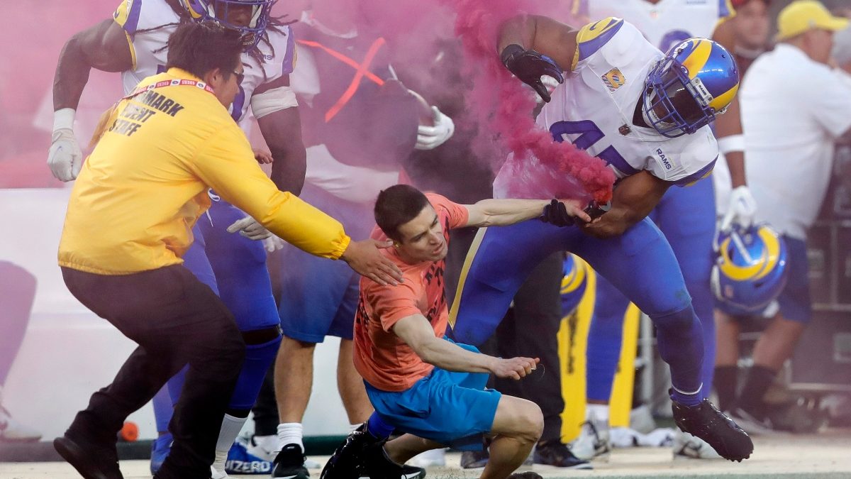 Los Angeles Rams star Bobby Wagner levels a fan on the field during 'Monday  Night Football'