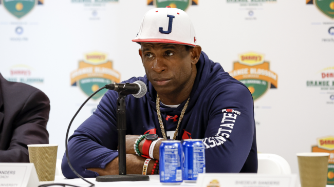Deion Sanders addresses the media after his game.