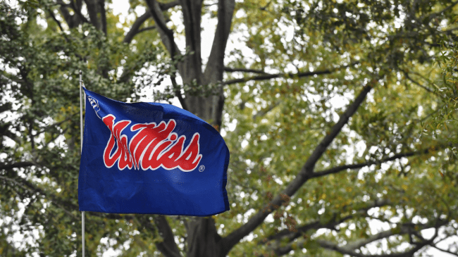 Ole Miss flag waves as Rebels face Arkansas.