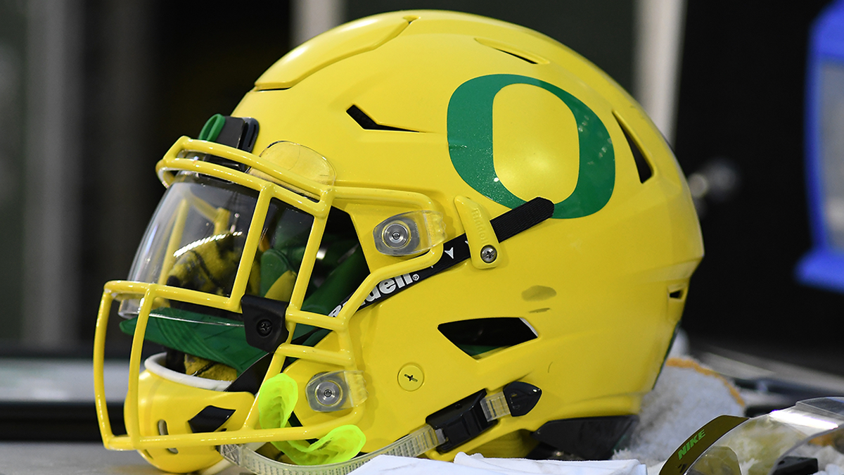 University of Oregon football helmet auction raises more than