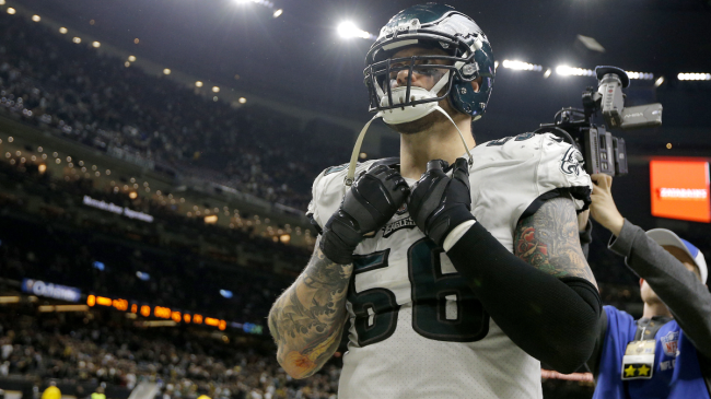Chris Long looks onto the playing field with the Eagles.