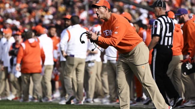 Dabo Swinney yells to his team from the sidelines.