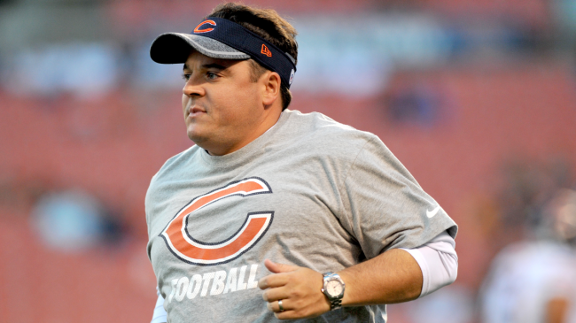 Dowell Loggains runs on the field before a Bears game.