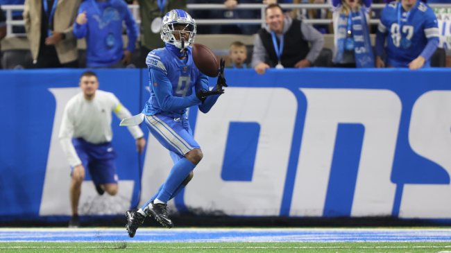 Detroit Lions' Jameson Williams catches a touchdown pass during