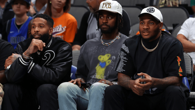 Odell Beckham, Jr. is seen at an NBA game with Micah Parsons and Trayvon Diggs of the Dallas Cowboys.