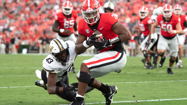 Arik Gilbert catches a pass.